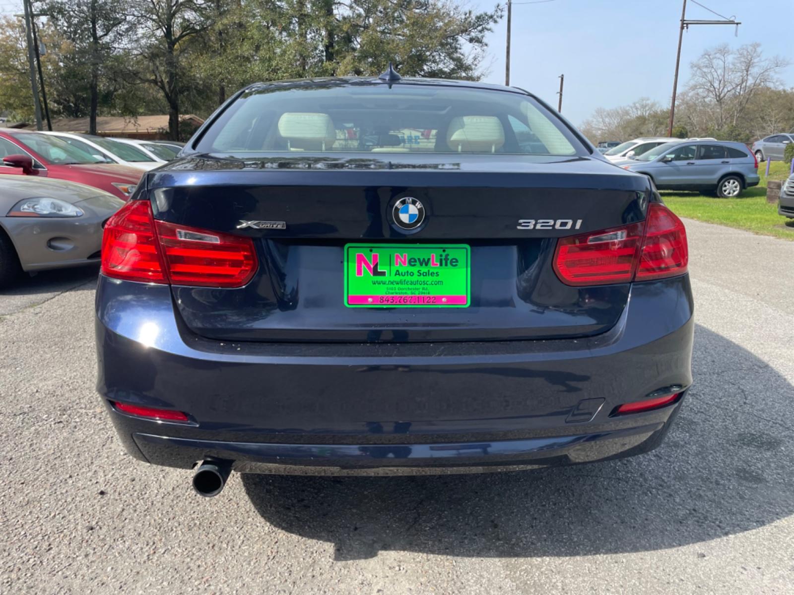 2014 BLUE BMW 3 SERIES 320I XDRIVE (WBA3C3G54EN) with an 2.0L engine, Automatic transmission, located at 5103 Dorchester Rd., Charleston, SC, 29418-5607, (843) 767-1122, 36.245171, -115.228050 - Local Trade-in with Leather, Sunroof, Navigation, CD/AUX/USB, Hands-free Phone, Dual Climate Control, Power Everything (windows, locks, seats, mirrors), Heated, Seats, Push Button Start, Keyless Entry, Alloy Wheels. Clean CarFax (no accidents reported) 101k miles Located at New Life Auto Sales! 202 - Photo #5